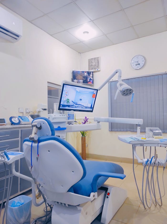 A tidy and modern dental clinic setup showcasing advanced dental equipment and tools in use.